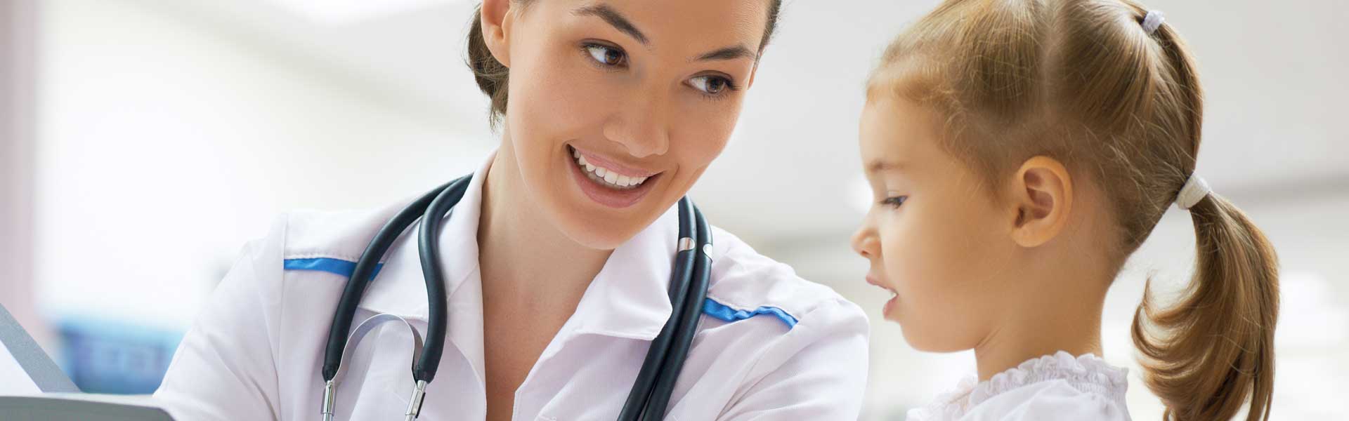 Doctor talking to child