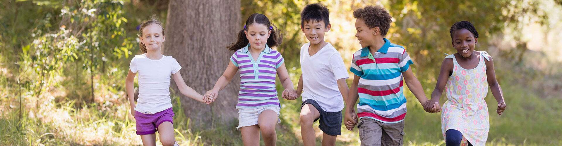 Group of children skipping 