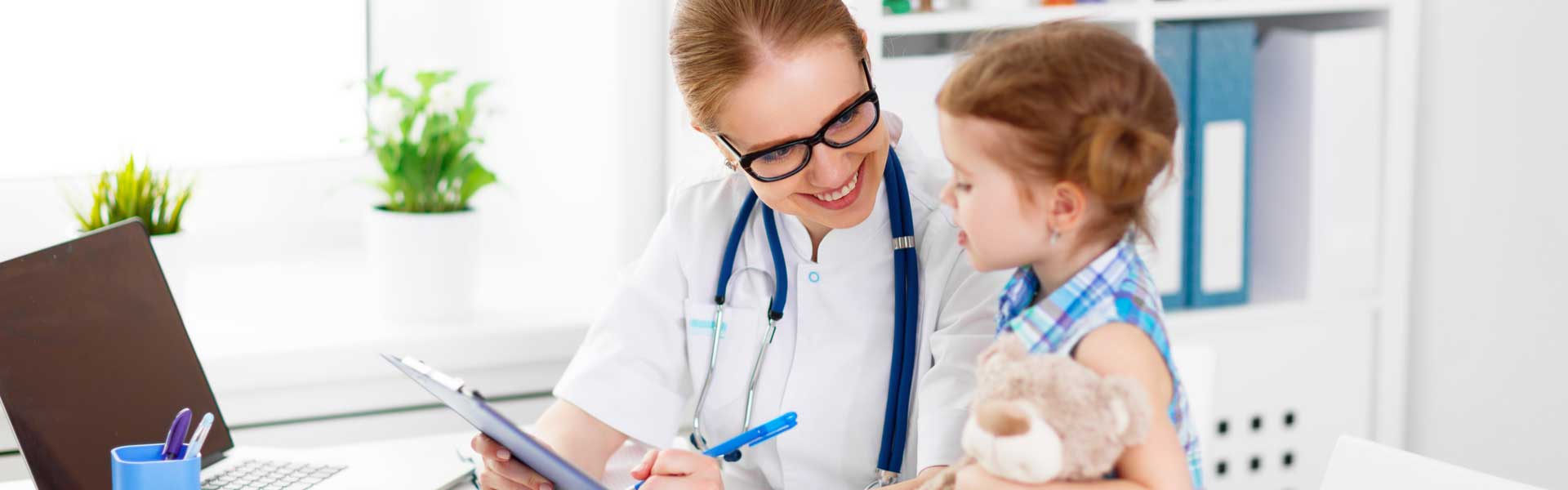 Doctor talking to child