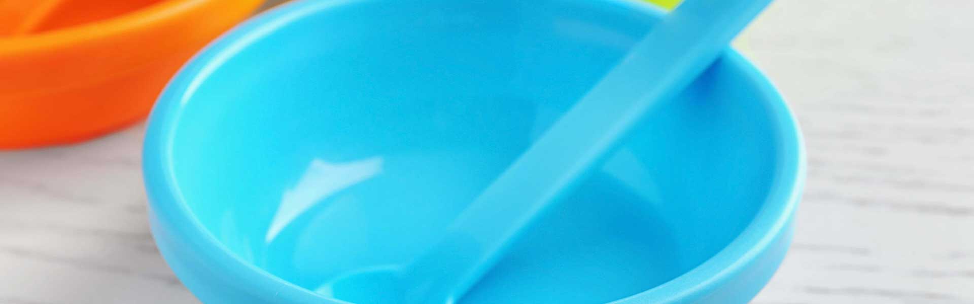 Empty blue bowl with spoon
