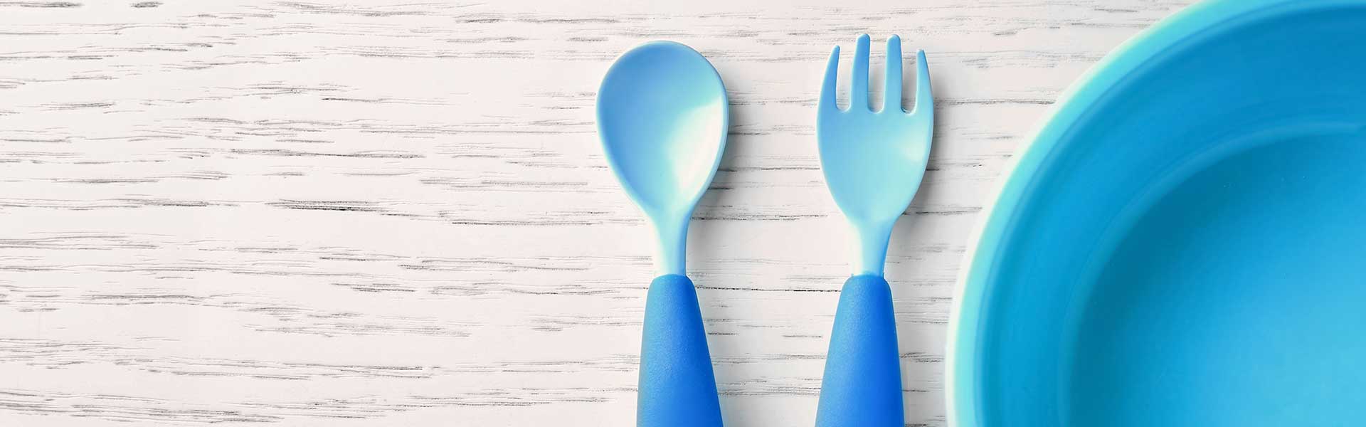 Child's spoon, fork and plate