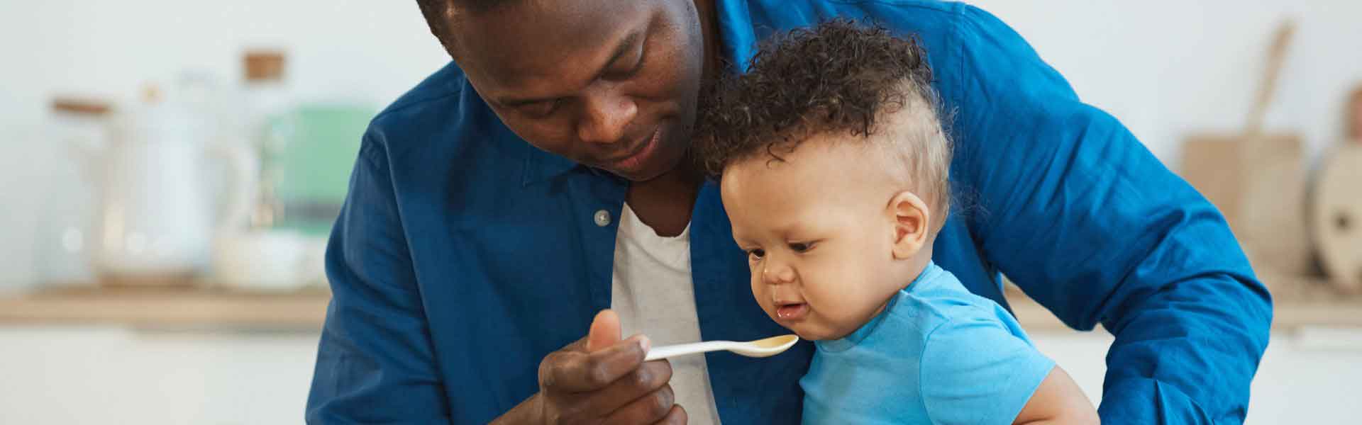 Father weaning a child
