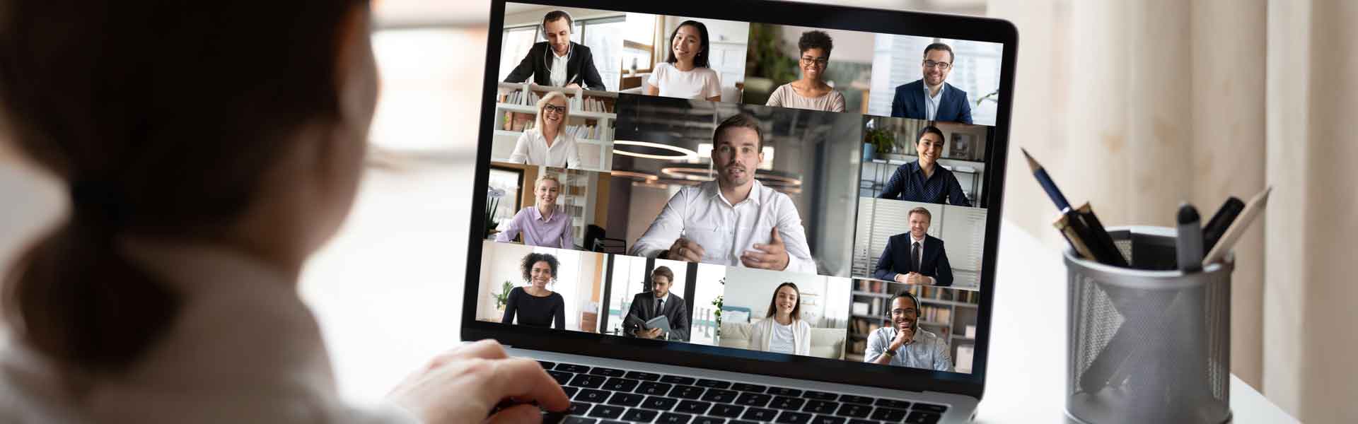 Woman watching a online meeting