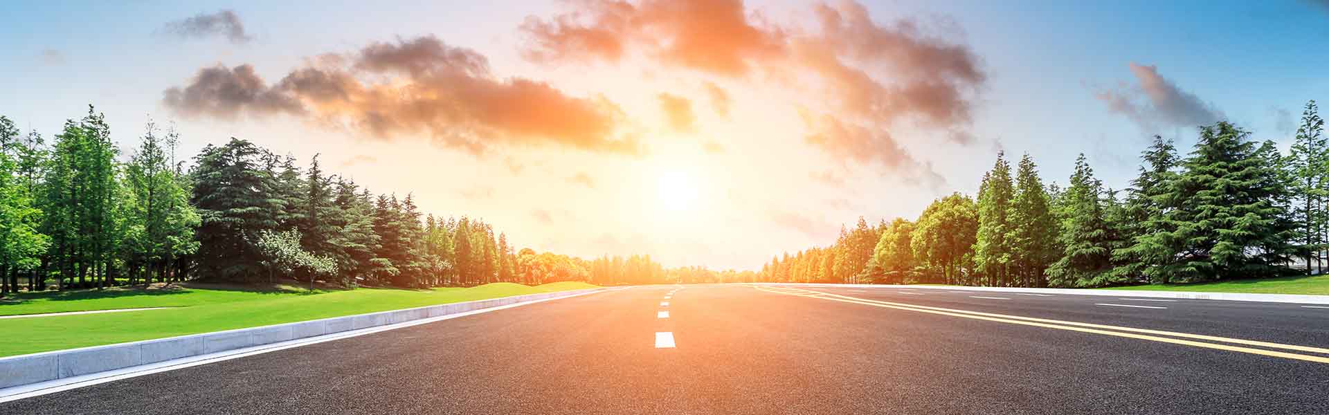 Straight road with sunset