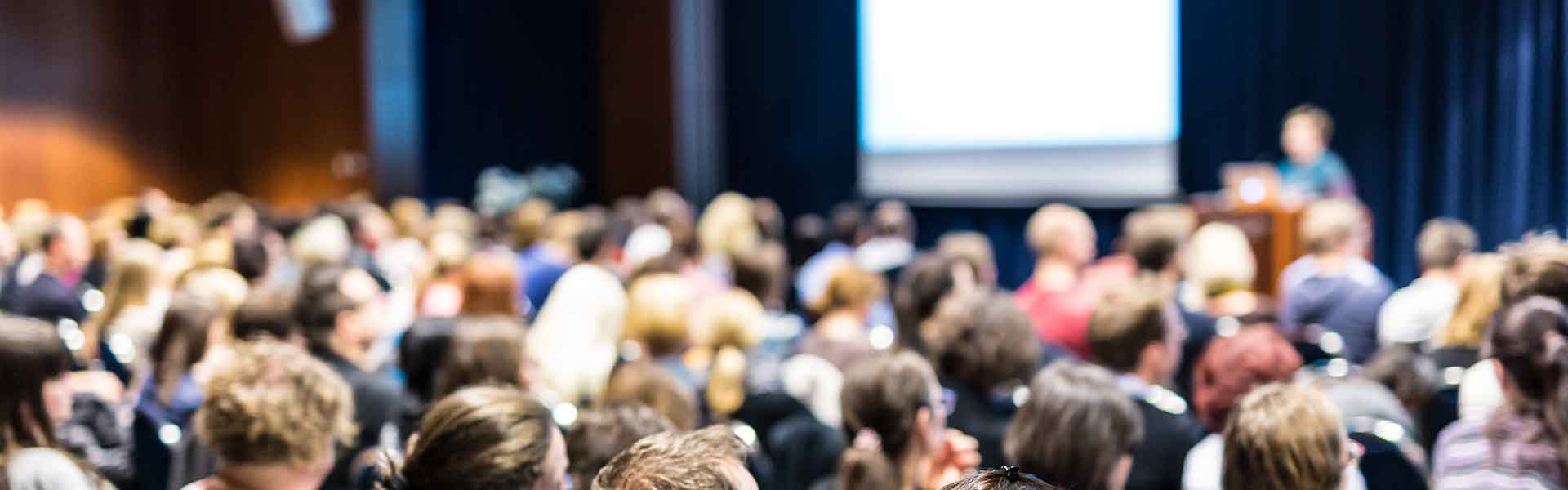 Speaker at a busy conference