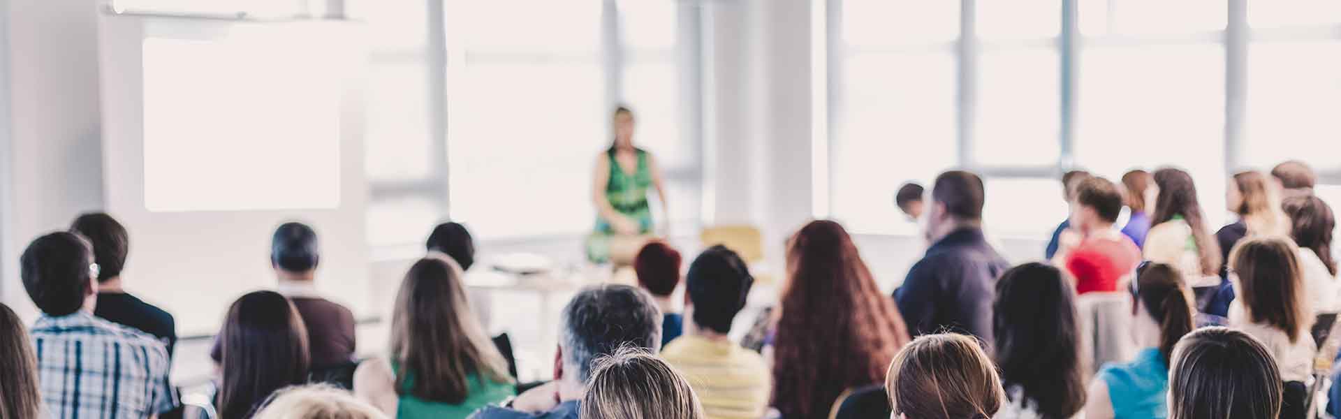 Audience watching a presentation