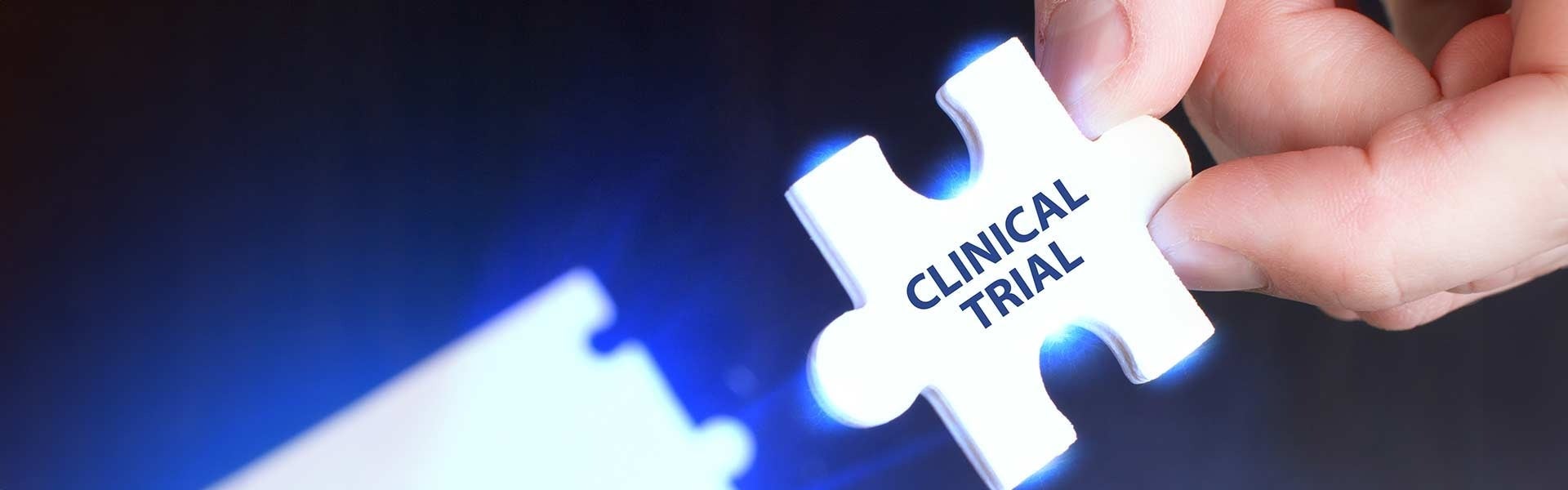puzzle piece with clinical trial written on it