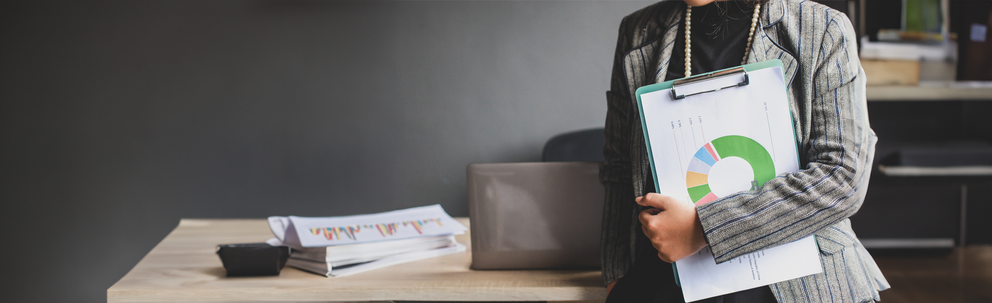 woman-stood-with-clipboard