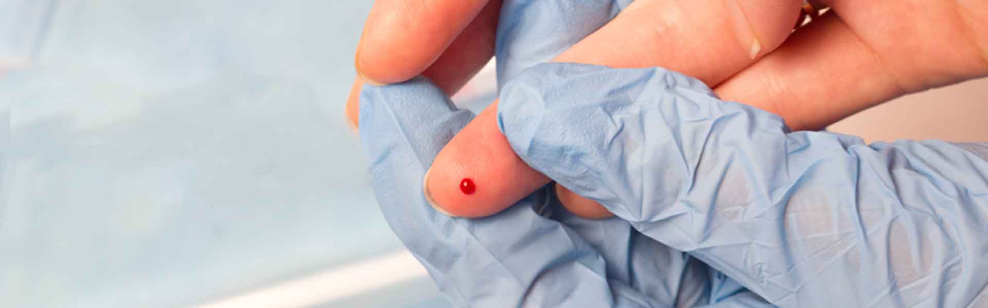 Blood spot on a finger