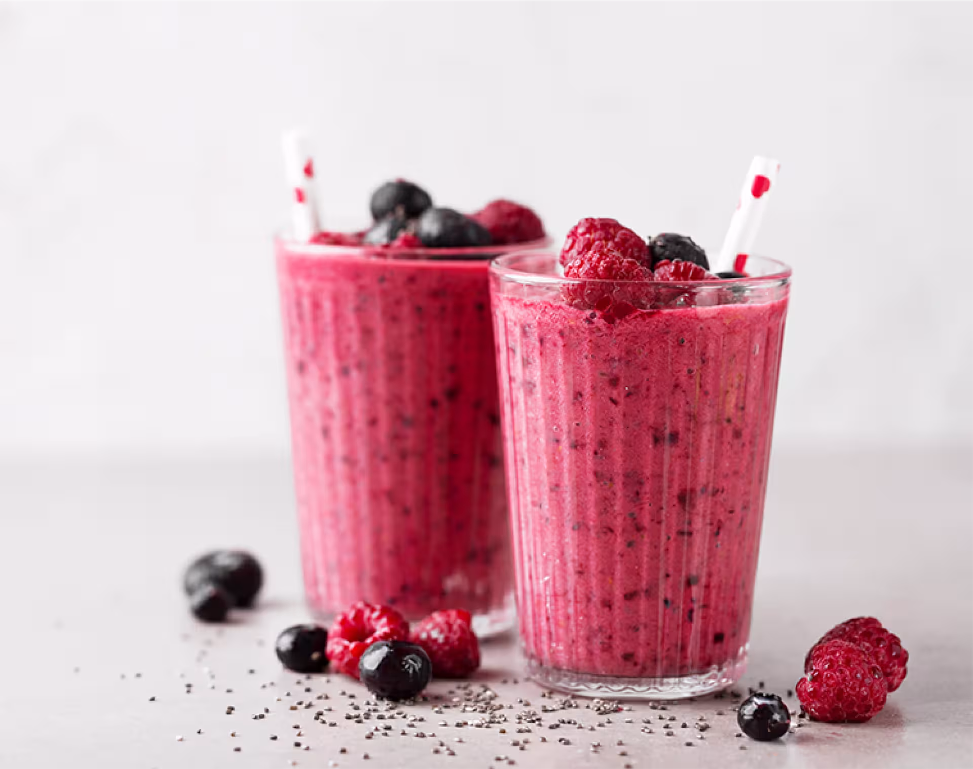 Two glasses of berry smoothie