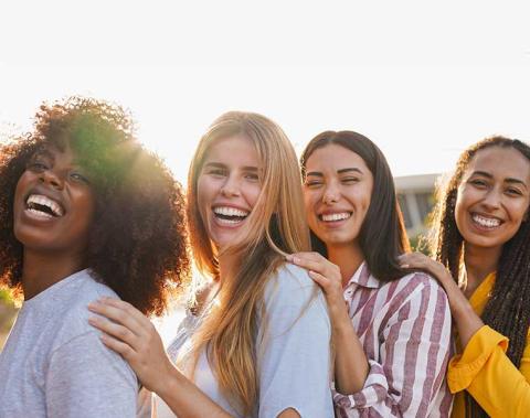 Smiling group of four women